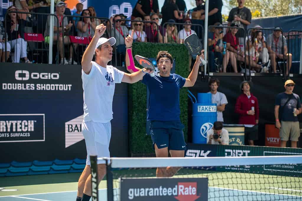 pickleball players celebrating a winner